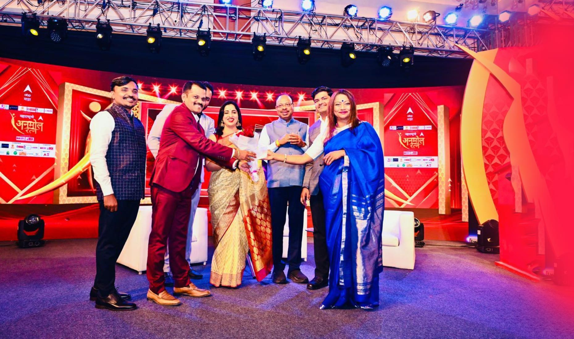 Merit Redevelopment Consultants team at ABP Maza Anmol Ratan Award